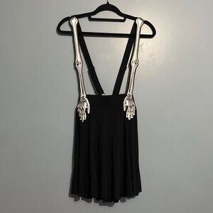 Skeleton hand suspender skirt